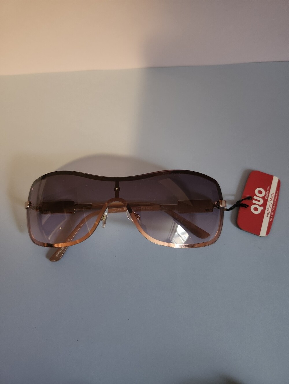 New Rimless Shield Metallic Rose Gold Quo Sunglasses